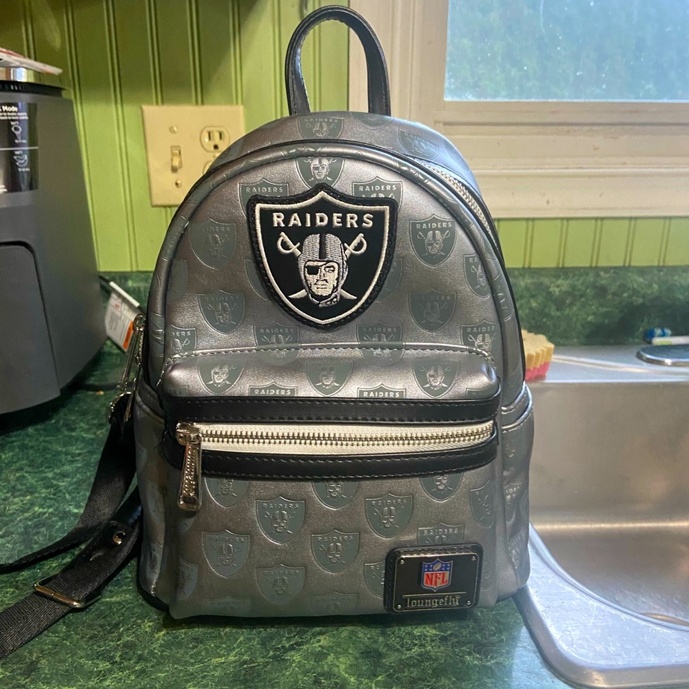 Like new Loungefly Las Vegas Raiders backpack, used 1 time